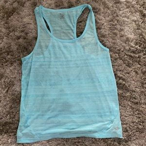 Champion Tank Top size small but easily fit medium